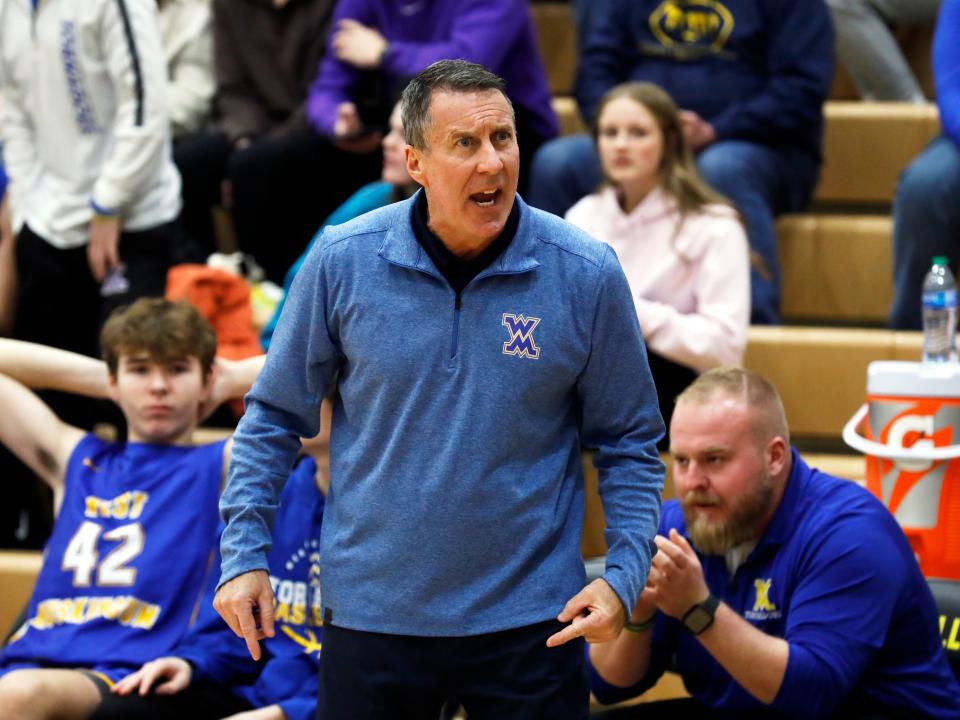 West Muskingum coach Jeff Rinkes argues a call during his team's 49-46 loss to host Tri-Valley on Tuesday night in Dresden.