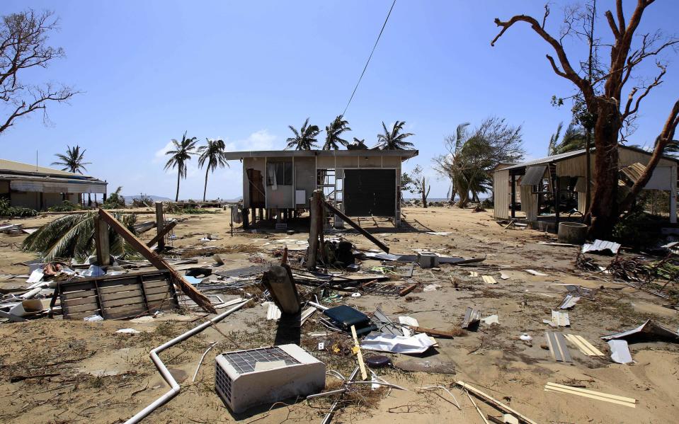 A beachside house is destroyed in Tully Heads by Cyclone Yasi. Source: AAP