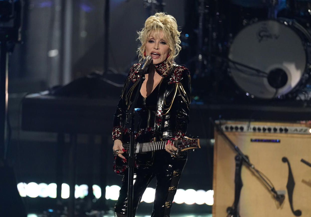 Inductee Dolly Parton performs during the Rock & Roll Hall of Fame Induction Ceremony on Saturday, Nov. 5, 2022, at the Microsoft Theater in Los Angeles. (AP Photo/Chris Pizzello)