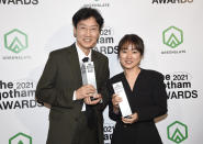 Kwang Dong-hyuk, left, and Kim Ji-yeon pose with the breakthrough series - long format award at the Gotham Awards at Cipriani Wall Street on Monday, Nov. 29, 2021, in New York. (Photo by Evan Agostini/Invision/AP)