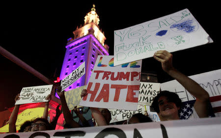 People protest against U.S. President-elect Donald Trump in Miami, Florida, U.S. November 11, 2016. REUTERS/Javier GaleanoTEMPLATE OUT