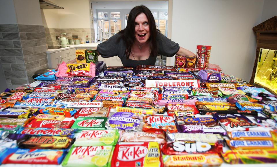 Ali Smith of Sheffield with her collection of limited edition confectionery.  [Photo: SWNS]