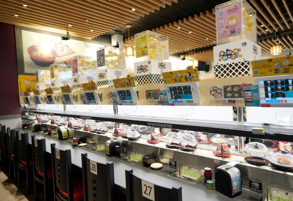 Jan. 18, 2024; Columbus, Ohio, USA; 
Kura Revolving Sushi Bar is a new restaurant at Polaris. Food is served via conveyor belts and robots and is priced by the plate. Patrons can sit in booths that sit four people or individually at this counter.