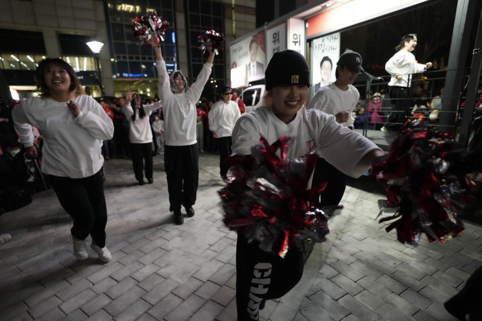 Supporters of the ruling People Power Party cheer during a campaign rally for the upcoming parliamentary election in Goyang, South Korea, Monday, April 8, 2024. As South Koreans head to the polls to elect a new 300-member parliament on this week, many are choosing their livelihoods and other domestic concerns as the most important election issues. It's in a stark contrast from past elections that were overshadowed by security and foreign policy issues like North Korean nuclear threats and U.S. security commitment for South Korea. (AP Photo/Ahn Young-joon)