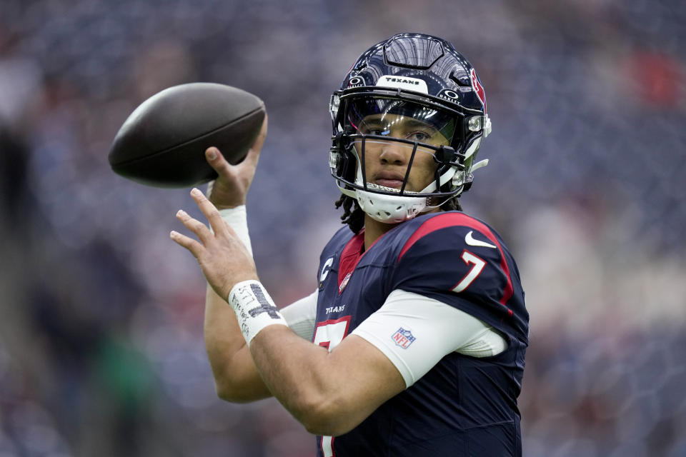 Houston Texans quarterback C.J. Stroud warms up before an NFL wild-card playoff football game between the Houston Texans and the Cleveland Browns Saturday, Jan. 13, 2024, in Houston. (AP Photo/Eric Christian Smith)