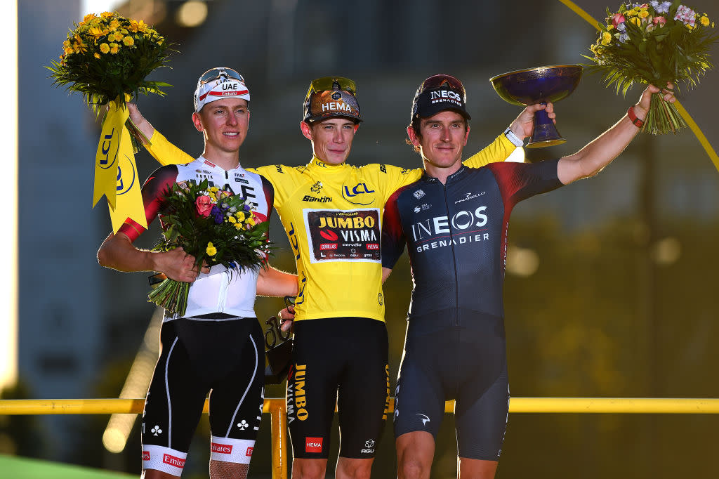  Jonas Vingegaard stands centre stage on the Tour de France podium in Paris  