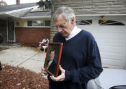 <p>Jimmy Drake holds a picture of and talks about his son Darren Drake, Wednesday, Nov. 1, 2017, in New Milford, NJ. Darren, a project manager for Moody’s Investors Service at the World Trade Center, was among those killed in the bike path attack in New York City. (Photo: Ed Murray NJ Advance Media via AP) </p>