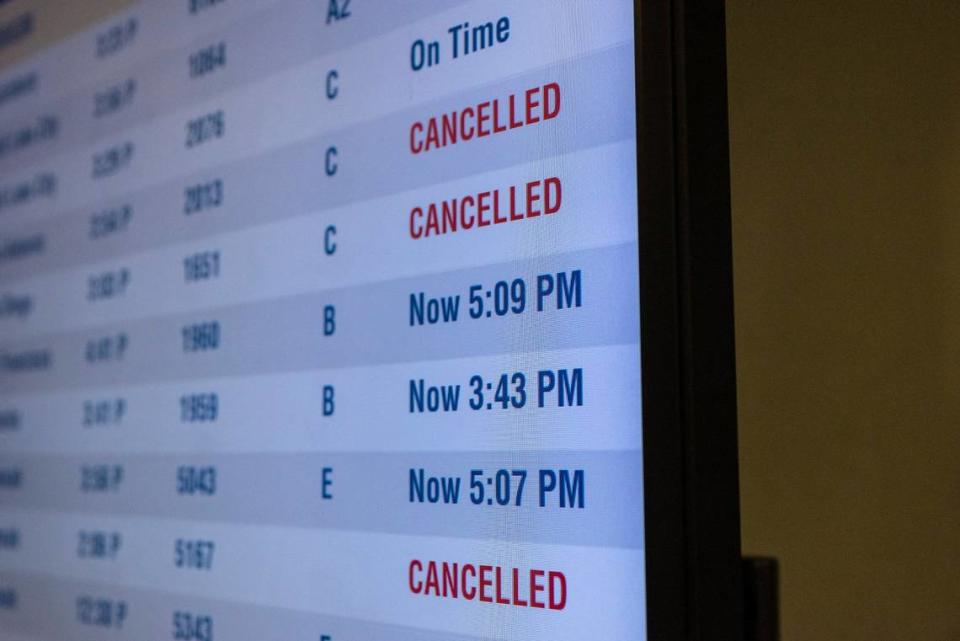 Screens show flight departures and cancellations at Charlotte Douglas International Airport on Saturday, January 22, 2022 in Charlotte, NC. Another bout with winter weather may be behind dozens of flight cancellations at CLT for Saturday, Jan. 29.