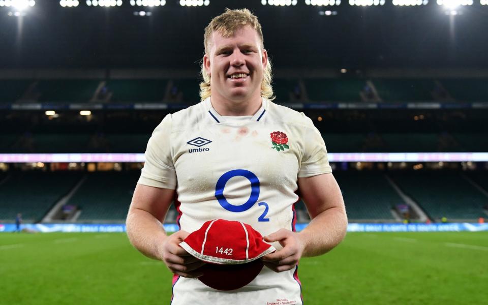 Nic Dolly of England poses for a photo with his first England Cap following the Autumn Nations Series match between England and South Africa at Twickenham Stadium on November 20, 2021 in London, England. - Dan Mullan - RFU/The RFU Collection via Getty Images