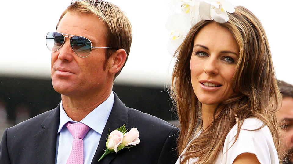 Shane Warne and LIz Hurley, pictured here at Flemington Racecourse in 2011.