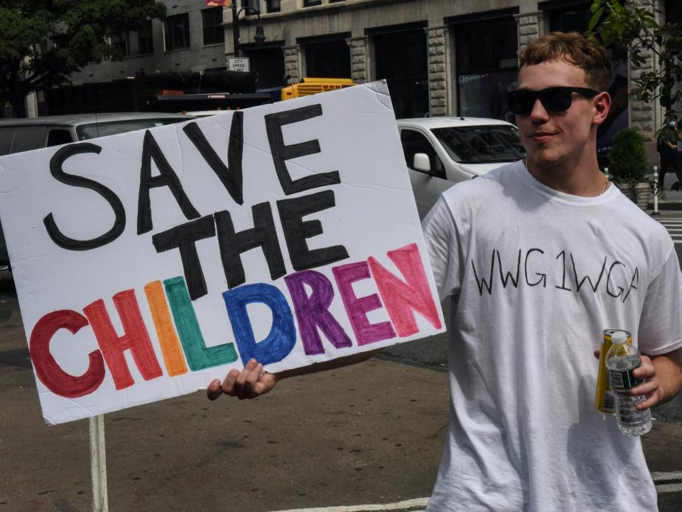 qanon save the children sign trump