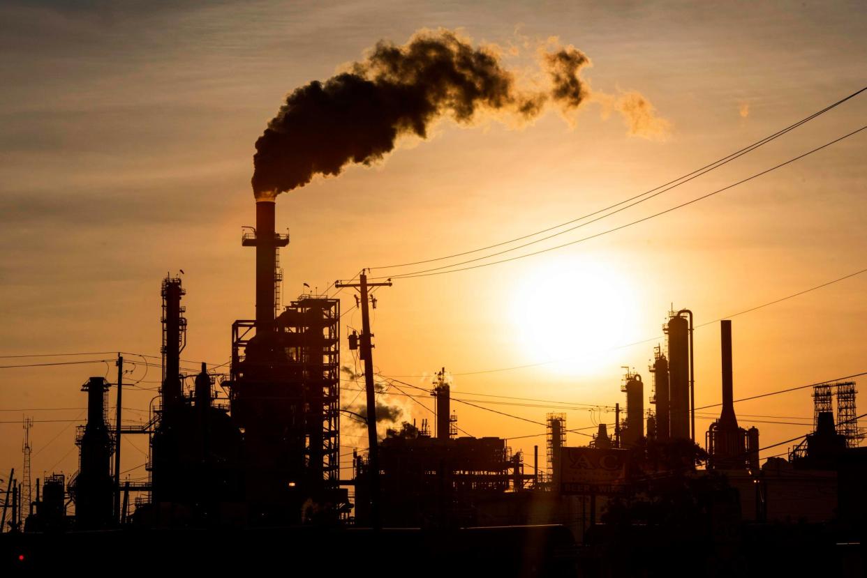 <span>An oil refinery in Houston, Texas, in 2020.</span><span>Photograph: Mark Felix/AFP/Getty Images</span>