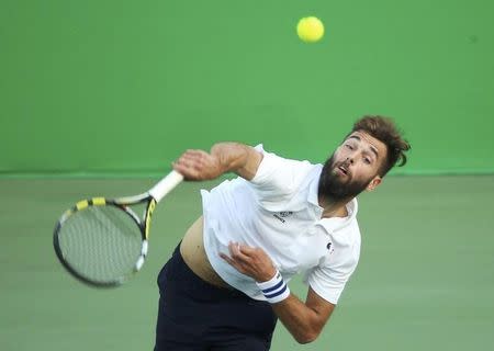 2016 Rio Olympics - Tennis - Preliminary - Men's Singles Second Round - Olympic Tennis Centre - Rio de Janeiro, Brazil - 09/08/2016. Benoit Paire (FRA) of France in action against Fabio Fognini (ITA) of Italy. REUTERS/Kevin Lamarque