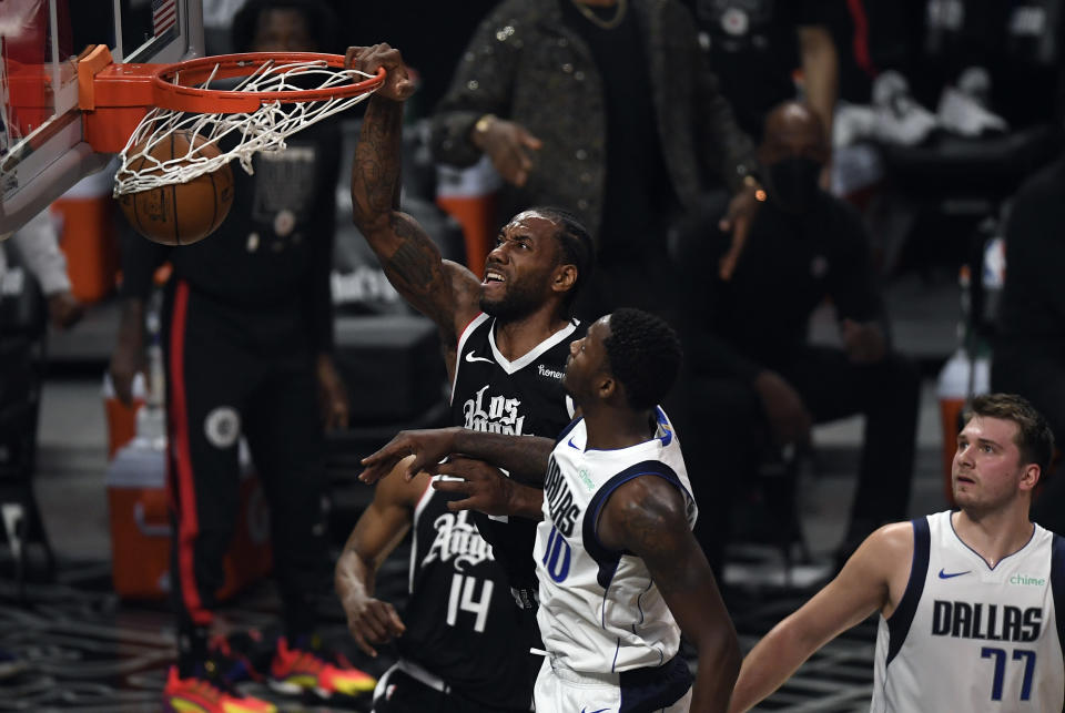 Kawhi Leonard dunks against Dorian Finney-Smith during Game 7 of the Western Conference first-round playoff series at Staples Center on June 6, 2021. (Kevork Djansezian/Getty Images)