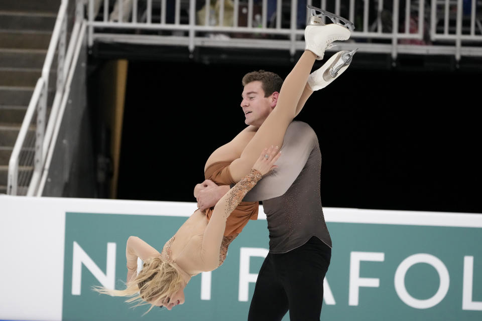 Brandon Frazier, top, and Alexa Knierim perform during the pairs free skate at the U.S. figure skating championships in San Jose, Calif., Saturday, Jan. 28, 2023. (AP Photo/Tony Avelar)