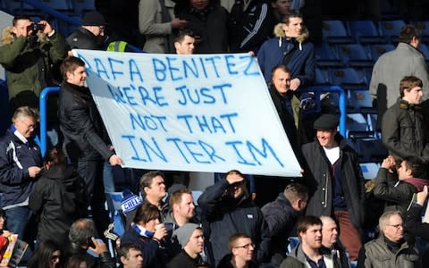 Chelsea fans hold a banner to show their discontent with Interim manager Raphael Benitez during the English Premier League football match between Chelsea and West Brom  - Credit: OLLY GREENWOOD/AFP/Getty Images