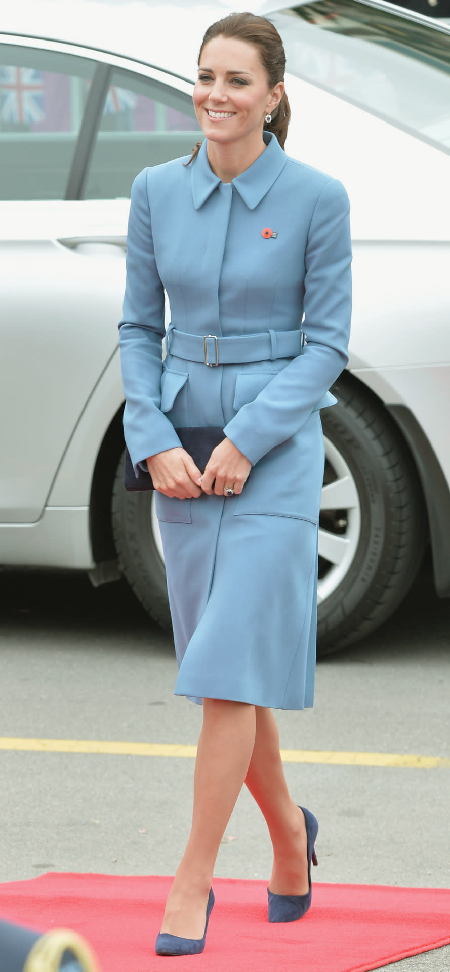<p>Kate visited a war memorial in New Zealand wearing a blue customised coat dress by Alexander McQueen. A suede Stuart Weitzman bag and navy shoes completed the sleek look. </p><p><i>[Photo: PA]</i></p>
