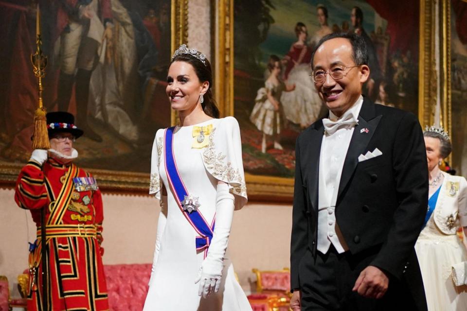 PHOTO: Britain's Catherine, Princess of Wales (L) and South Korea's Deputy Prime Minister Choo Kyung-ho arrive for a State Banquet at Buckingham Palace in central London on Nov. 21, 2023. (Yui Mok/POOL/AFP via Getty Images)