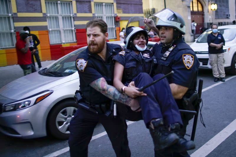 Protesters rally against the death in Minneapolis police custody of Floyd, in the Brooklyn borough of New York City