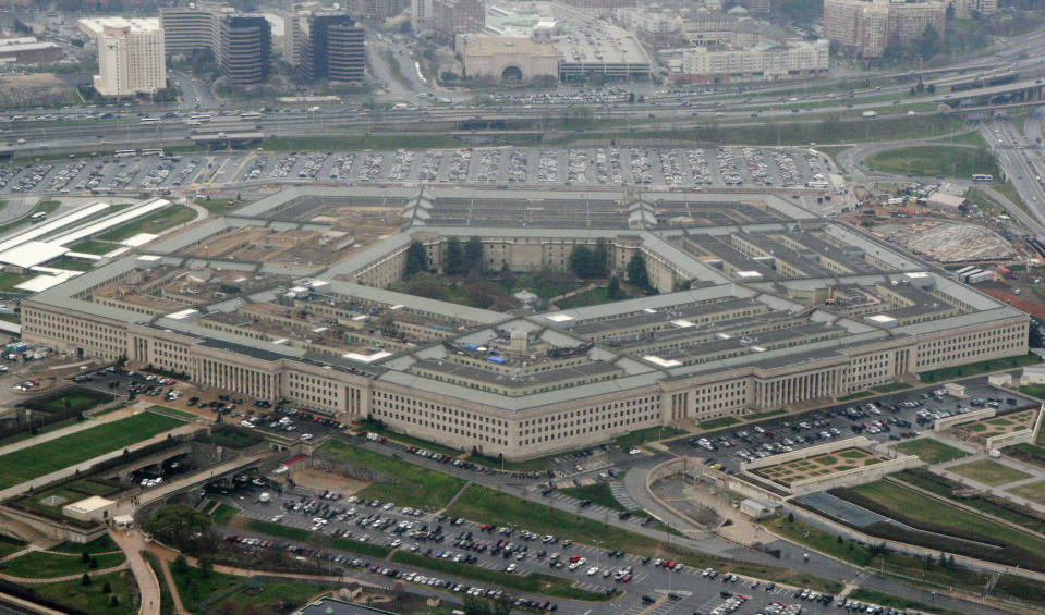 FILE - This March 27, 2008, file photo, shows the Pentagon in Washington. The Pentagon says the U.S. will send several dozen fighter jets along with other aircraft and additional air defenses to Saudi Arabia to help protect the kingdom from Iranian attacks. (AP Photo/Charles Dharapak, File)