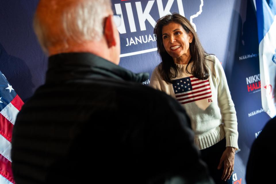 Republican presidential candidate Nikki Haley meets with voters after a town hall event Monday, Dec. 18, 2023, in Carroll.