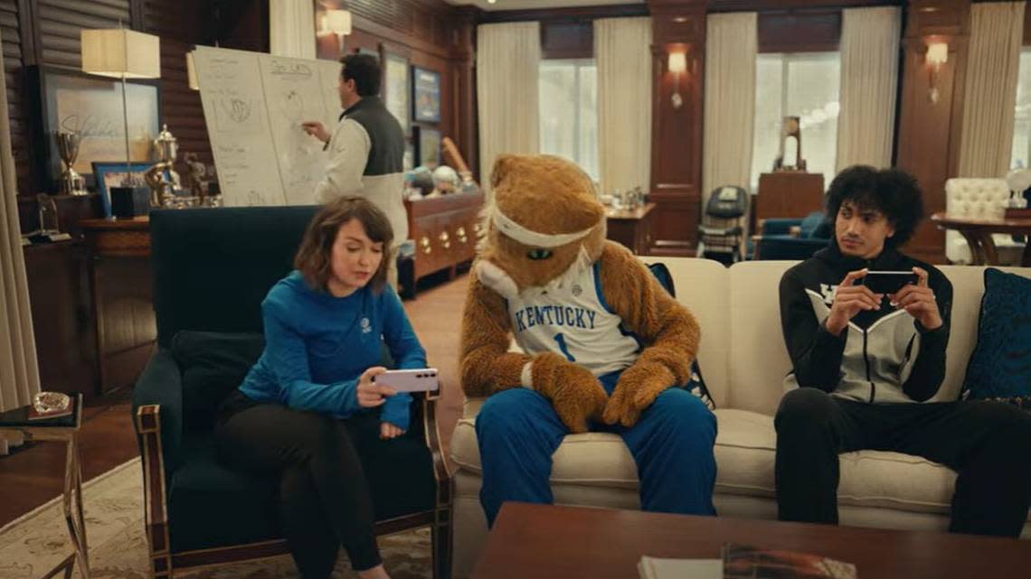 Actress Milana Vayntrub, left, the Kentucky Wildcat mascot, and Jacob Toppin star in a new AT&T commercial that will run during the NCAA Tournament.