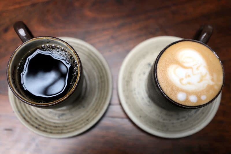 FILE PHOTO: A cup of coffee and a cappuccino are seen at a Juan Valdez store in Bogota