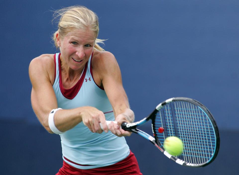 Jill Craybas returns a shot to Iveta Benesova of the Czech Republic during the US Open on Aug. 28, 2006. Craybas, of East Greenwich, had a long pro career that went from1996 until she retired in 2013.