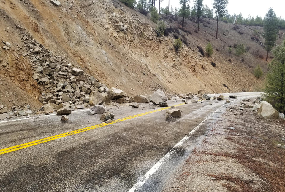 This photo provided by Tyler Beyer shows a rockslide on Highway 21 near Lowman, Idaho, after a magnitude 6.5 earthquake struck Tuesday, March 31, 2020. The earthquake struck north of Boise, Idaho, Tuesday evening, with people across a large area reporting shaking. (Tyler Beyer via AP)