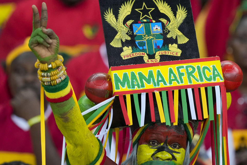 A fan of Ghana cheers prior to the start of the African Cup of Nations Group B soccer match between Mozambique and Ghana in Abidjan, Ivory Coast, Monday, Jan.22, 2024. (AP Photo/Sunday Alamba)