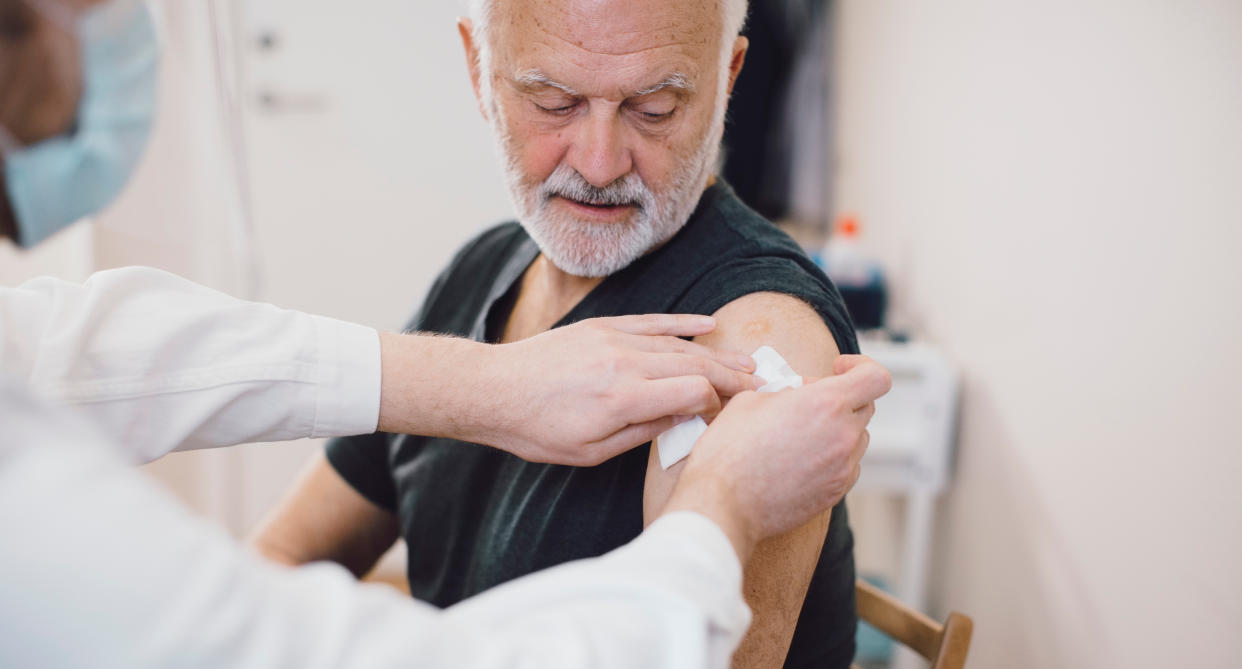 Man getting COVID booster vaccine