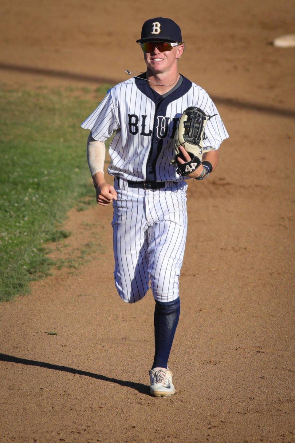 Jake Hixenbaugh runs in from left field during the San Luis Obispo Blues’ game against the Santa Barbara Foresters on July 3, 2023.