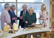 <p>Busted! During a visit to ITV's program <em>This Morning </em>in January 2018, Camilla, looking very guilty, went for an extra forkful between shots while Charles visited with some of the show's anchors and chefs. In fairness to Camilla, those <a href="https://www.goodhousekeeping.com/holidays/thanksgiving-ideas/g297/easy-mashed-potatoes-recipes/" rel="nofollow noopener" target="_blank" data-ylk="slk:potatoes;elm:context_link;itc:0;sec:content-canvas" class="link ">potatoes</a>(?) do look <em>very</em> tasty, so we totally get why she'd want to have just one more bite.</p>