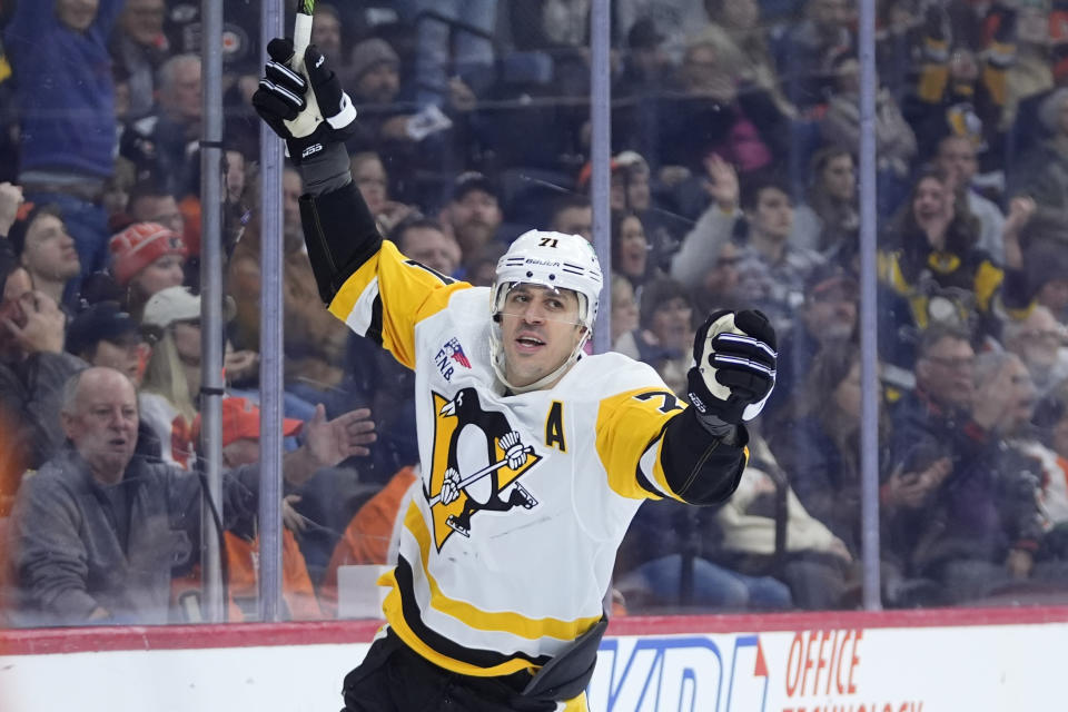 Pittsburgh Penguins' Evgeni Malkin reacts after scoring a goal during the third period of an NHL hockey game against the Philadelphia Flyers, Monday, Jan. 8, 2024, in Philadelphia. (AP Photo/Matt Slocum)