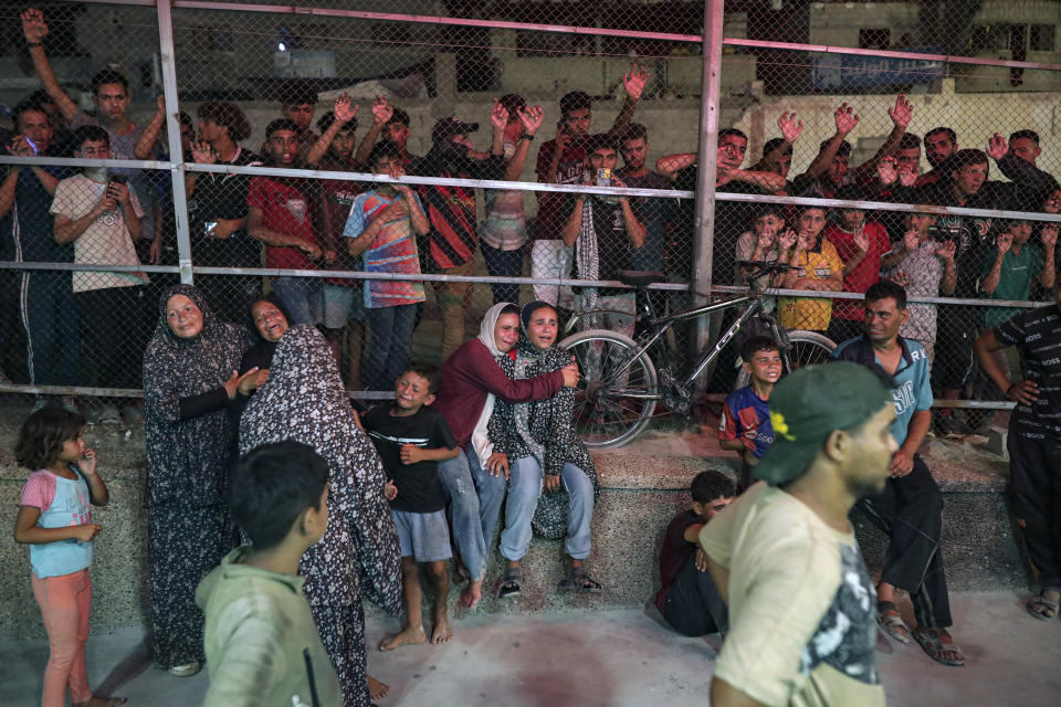 Palestinians react after their relative was killed in Israeli bombardment of the Gaza Strip at a hospital in Khan Younis, Thursday, June. 27, 2024. (AP Photo/Jehad Alshrafi)