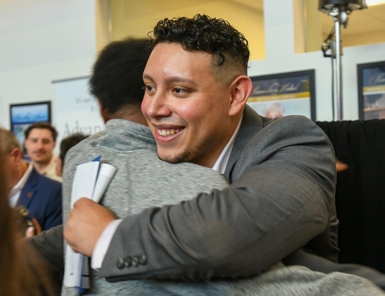 Medical student Christian Pineda is congratulated on Match Day at UMass Chan Medical School Friday.