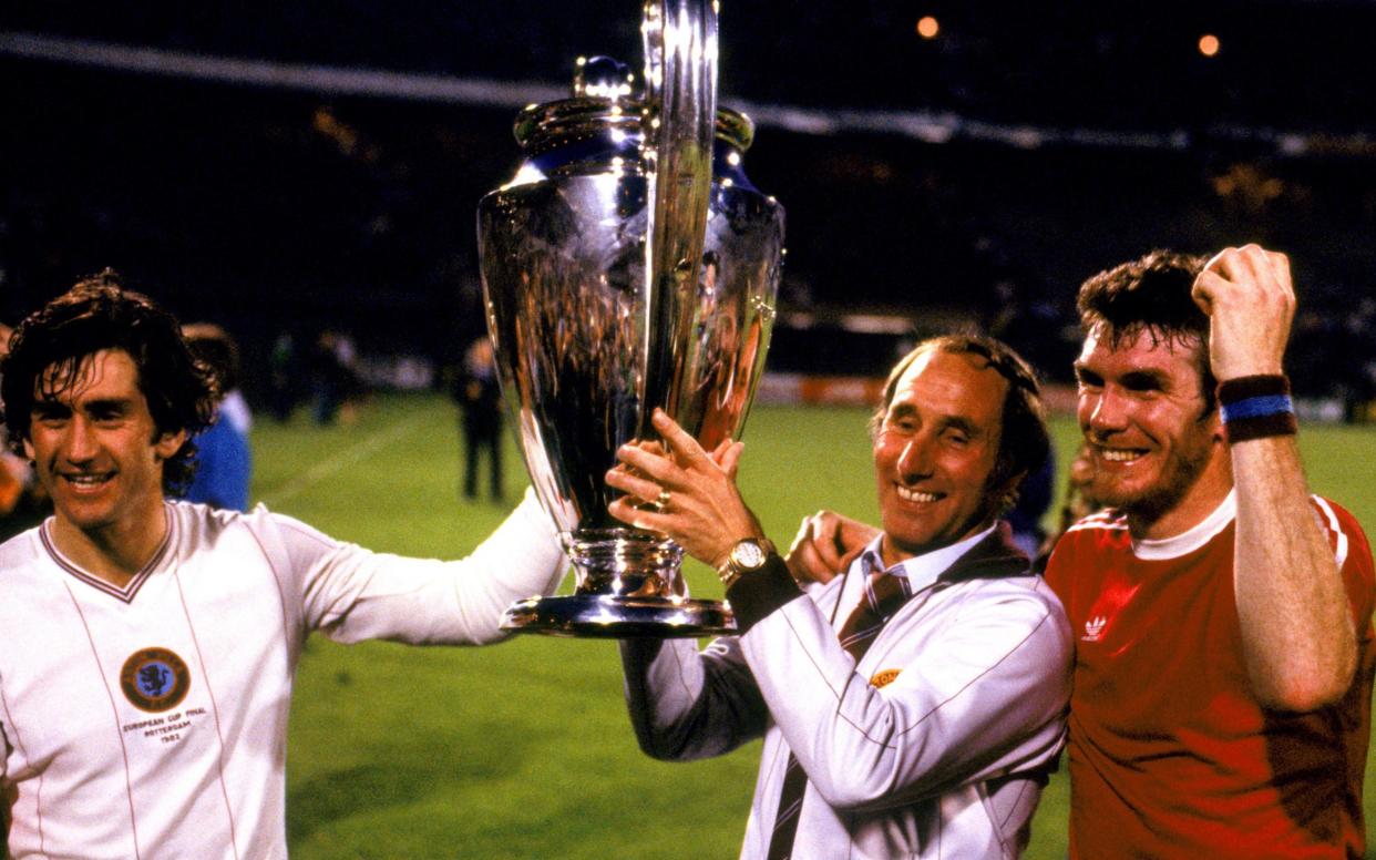 Aston Villa manager Tony Barton (centre) celebrates with the European Cup, with captain Dennis Mortimer (left) and winning goalscorer Peter Withe (right) in 1982