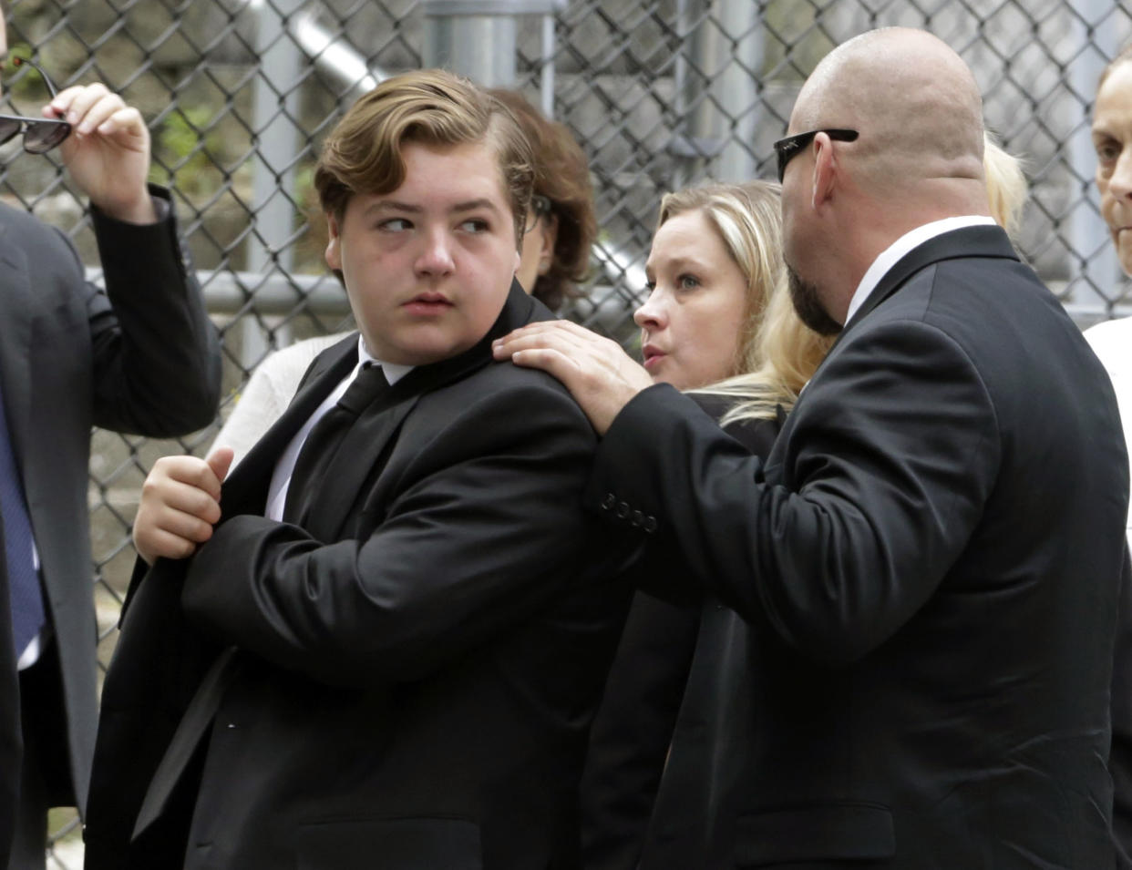 Michael Gandolfini, left, son of James Gandolfini, arrives for the funeral service of his father, star of 