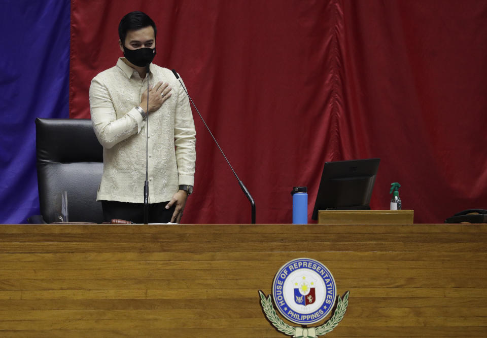 New House Speaker Lord Allan Velasco gestures during his first day at the House of Representatives in Quezon city, Philippines, Tuesday, Oct. 13, 2020. A large faction of Philippine legislators in the House of Representatives elected a new leader Monday in a tense political standoff between two allies of the president. (AP Photo/Aaron Favila)