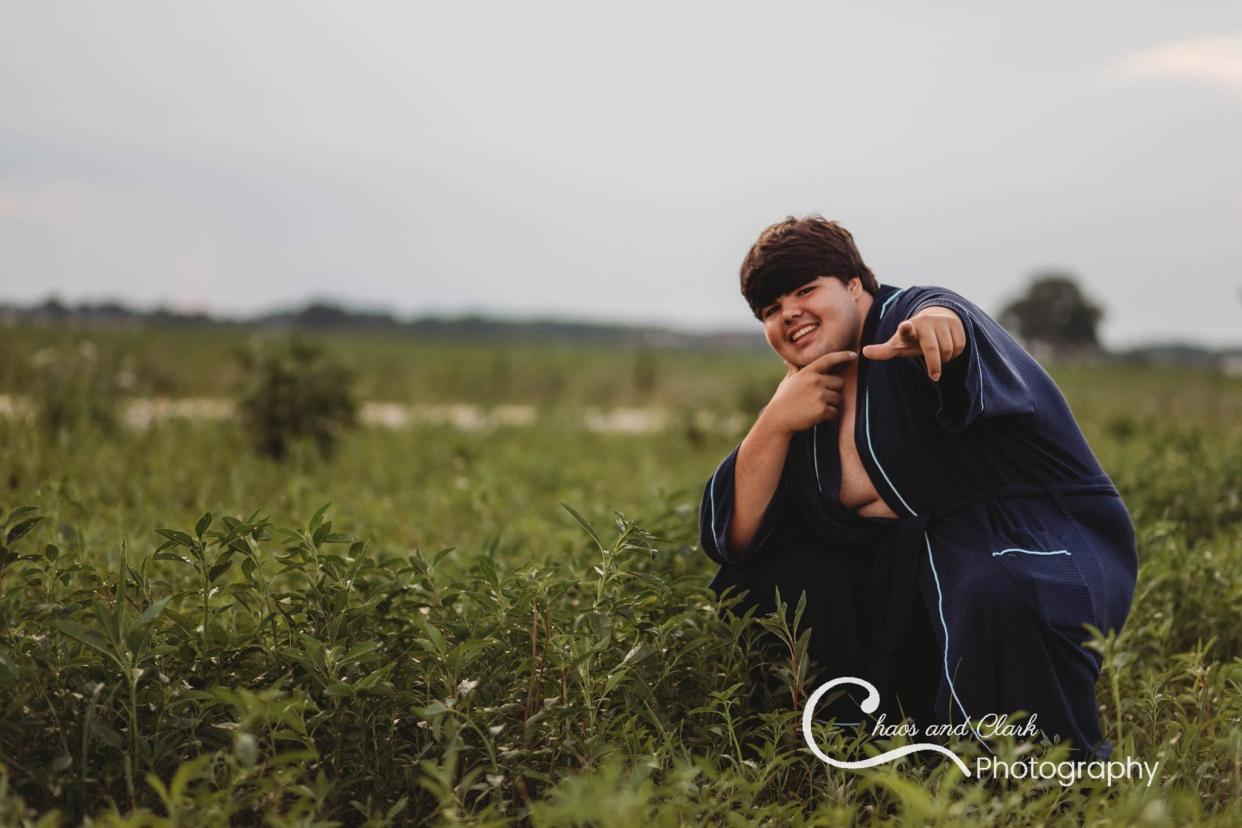 Evan Dennison is a senior at Portage High School. He surprised everyone by taking his senior photos in a bathrobe to do something unique and become a 