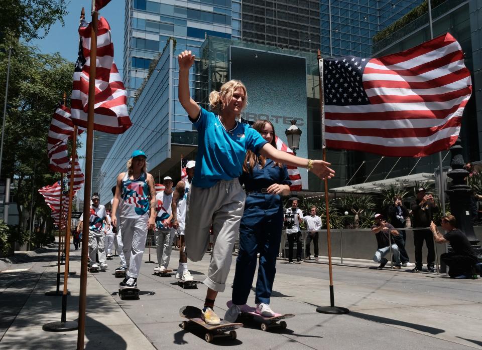 Bryce Wettstein (center) arrives with other members of the first U.S. Olympic skateboarding team for a news conference in downtown Los Angeles on June 21. Wettstein is one of several teenagers competing for Team USA in a variety of sports in Tokyo before returning to high school in the fall.