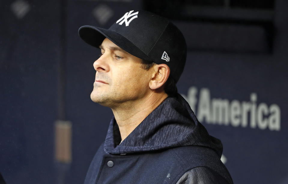 Yankees manager Aaron Boone opted against the comforts of home and slept at Yankee Stadium after Friday’s game went into Saturday morning. (AP)