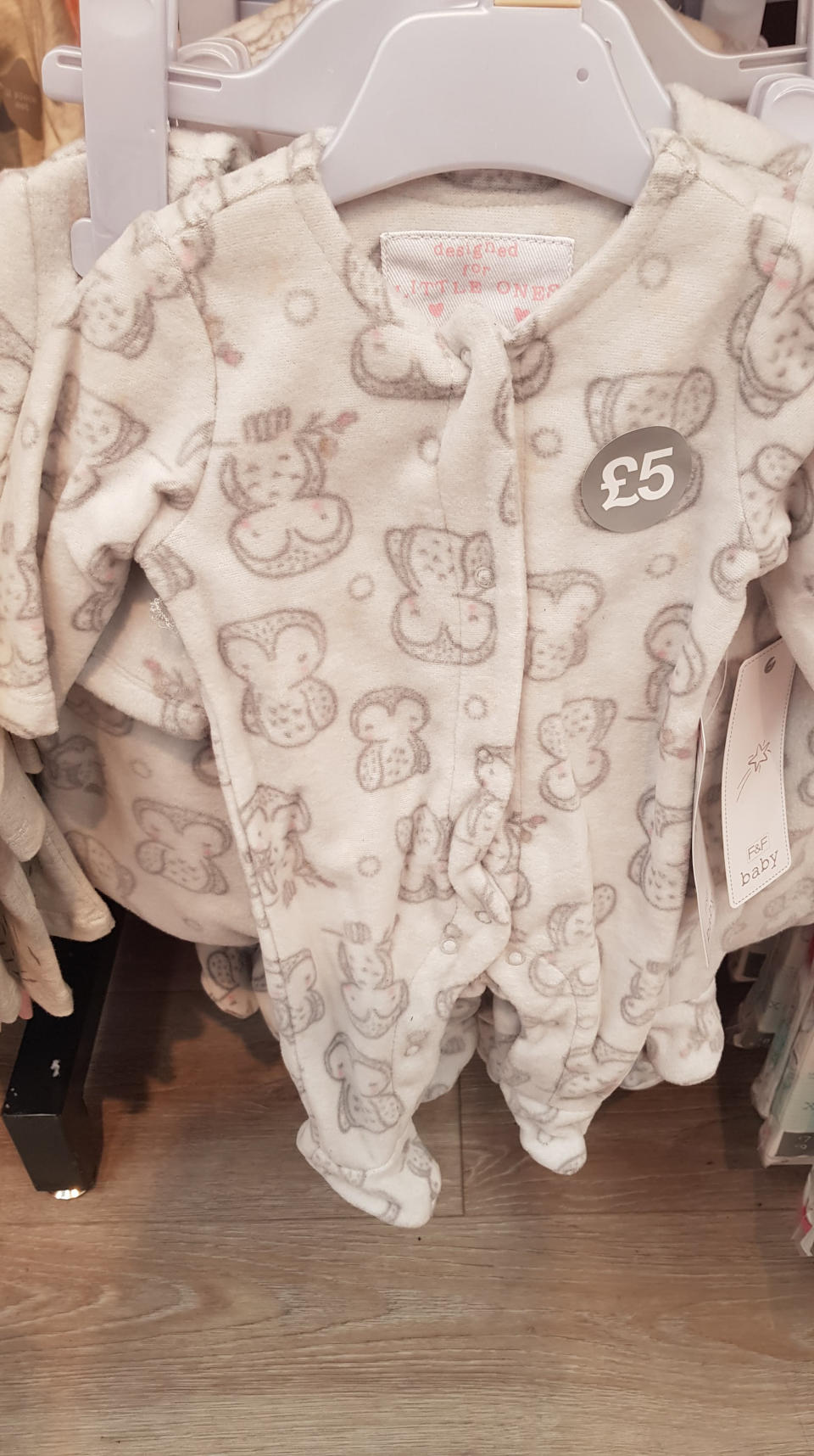 A mum has spotted this innocent baby onesie has an x-rated flaw. Source: Mercury News