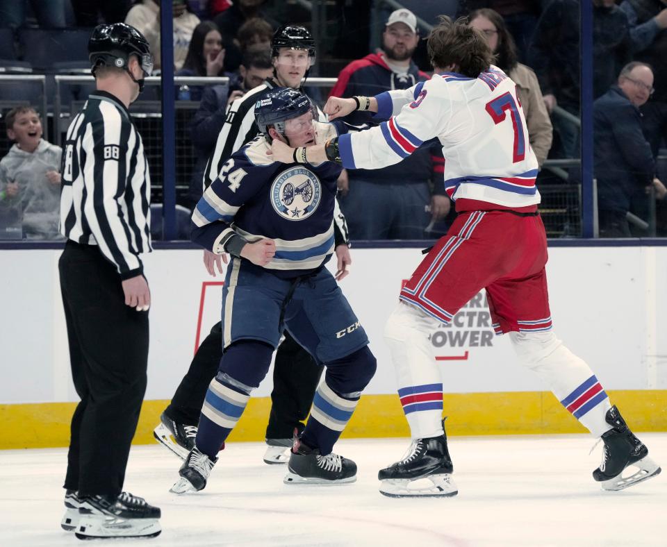 Feb. 25, 2024; Columbus, Ohio, USA; 
Columbus Blue Jackets right wing Mathieu Olivier (24) and New York Rangers center Matt Rempe (73) fight during the first period of an NHL game at Nationwide Arena on Sunday.