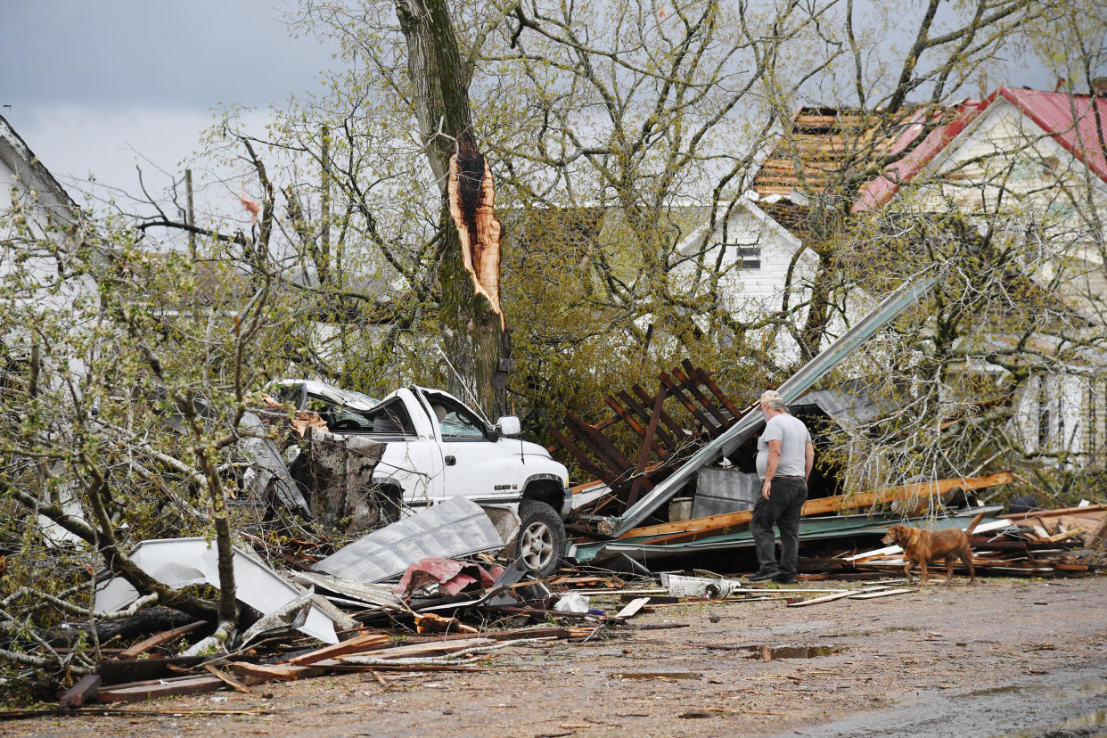 A man surveys the debris outside his destroyed home on April 5, 2023 in Glenallen, Mo. (Michael B. Thomas / Getty Images)
