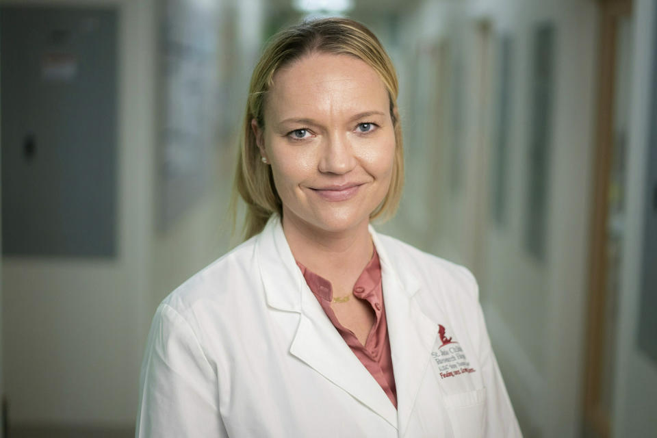 In this April 2019 photo provided by the St. Jude Children's Research Hospital, Dr. Ewelina Mamcarz poses for a portrait at the hospital in Memphis. A study released on Wednesday, April 17, 2019 details how scientists turned HIV into a savior, altering it so it couldn't cause disease and then using it to deliver a gene eight babies with "bubble boy disease" lacked. "This therapy has cured the patients," though it will take more time to see if it's a permanent fix, said Mamcarz, one of the study leaders. (Peter Barta/St. Jude Children's Research Hospital via AP)