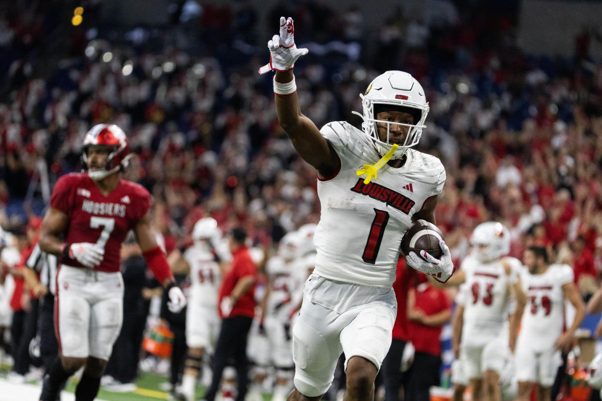 Louisville wide receiver Jamari Thrash celebrates as he scores a touchdown at Indiana.