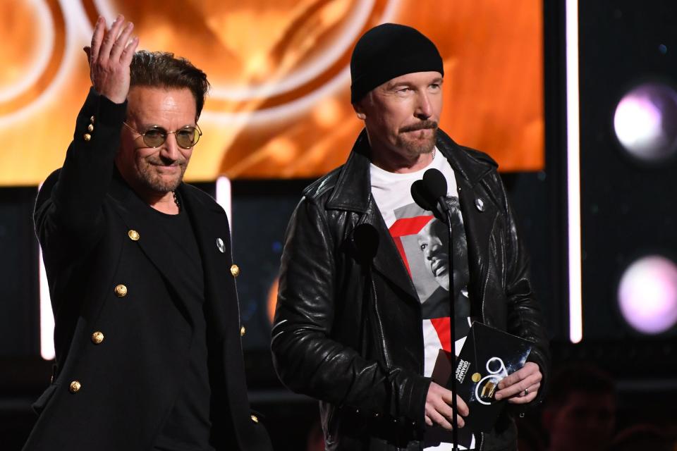 Bono and The Edge of U2 presents Album Of The Year during the 60th Annual Grammy Awards at Madison Square Garden. 