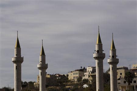 The four minarets of a new mosque are seen in the Israeli-Arab village of Abu Ghosh, near Jerusalem November 22, 2013. REUTERS/Ronen Zvulun