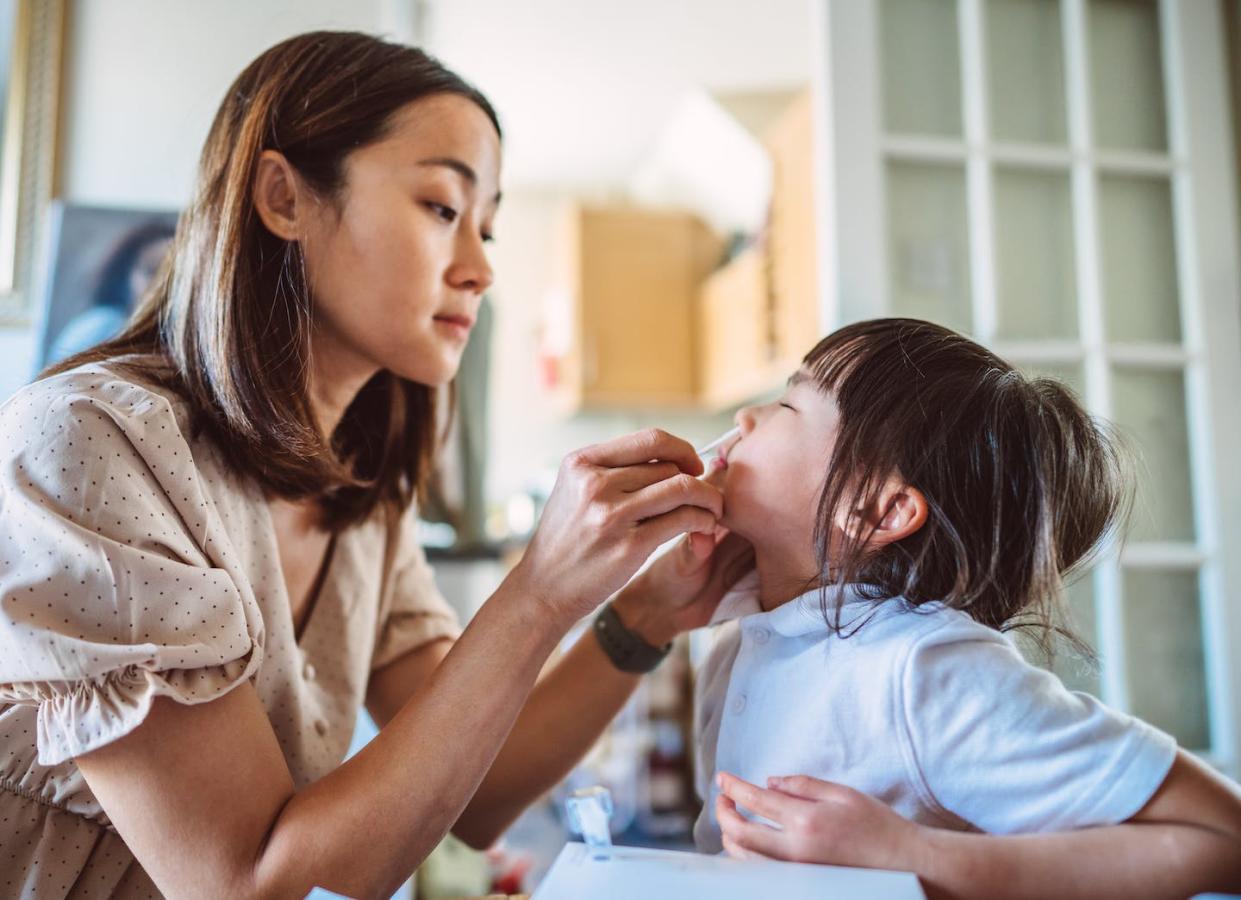 Technique matters when it comes to getting a sufficient amount of virus for a rapid test. <a href="https://www.gettyimages.com/detail/photo/young-asian-mom-carrying-out-a-covid-19-self-test-royalty-free-image/1361590313?phrase=negative%20covid%20test&adppopup=true" rel="nofollow noopener" target="_blank" data-ylk="slk:Images By Tang Ming Tung/Digital Vision via Getty Images;elm:context_link;itc:0;sec:content-canvas" class="link ">Images By Tang Ming Tung/Digital Vision via Getty Images</a>